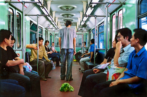 11_10-walking-the-cabbage-in-the-subway-beijing-2004wb